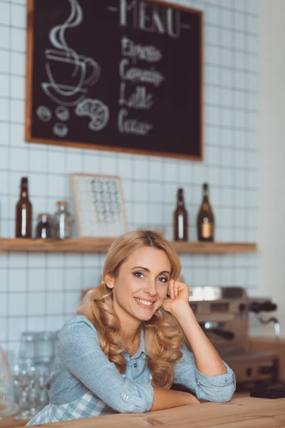 Beautiful waitress in cafe — Stock Photo