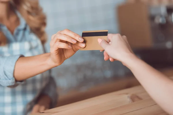 Payment with credit card in cafe — Stock Photo