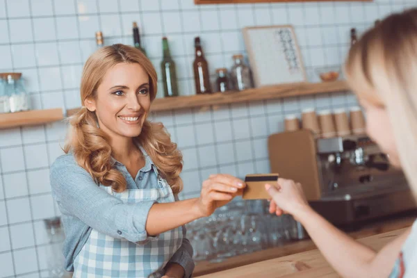 Payment with credit card in cafe — Stock Photo