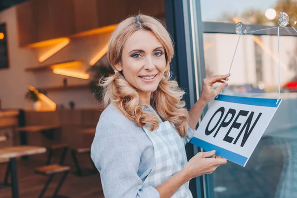 Waitress with sign open — Stock Photo