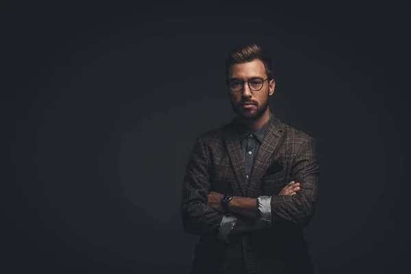 Young man with arms crossed — Stock Photo