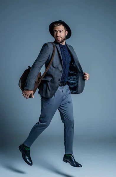 Man in suit jumping up — Stock Photo