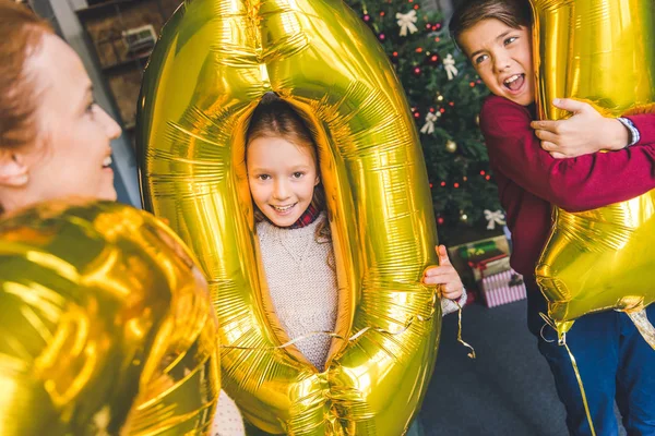 Family having fun on new year — Stock Photo