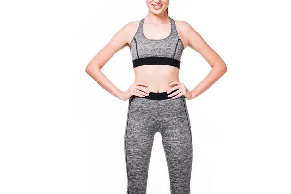 Happy sportswoman with hands on waist — Stock Photo