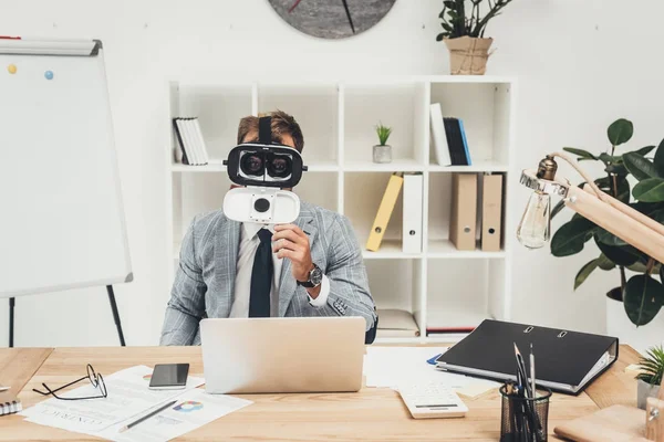 Businessman in vr headset — Stock Photo