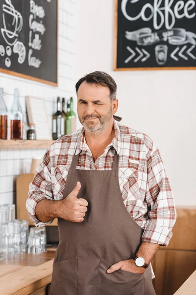 Bartender showing thumb up — Stock Photo