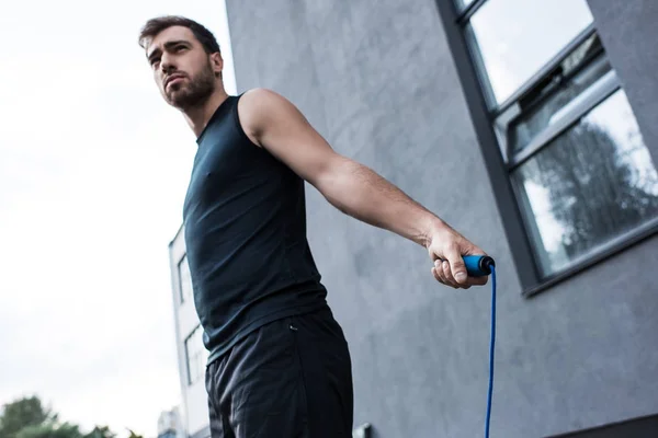 Sportsman with jumping rope — Stock Photo