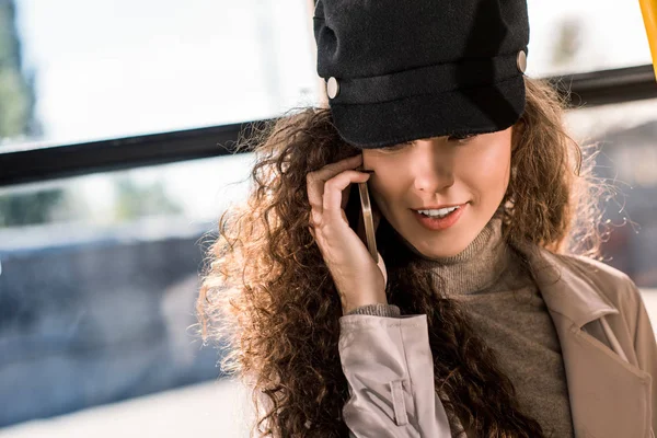 Girl using smartphone in bus — Stock Photo