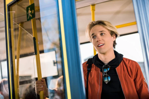 Young man in bus — Stock Photo