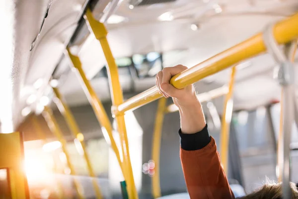 Person standing in bus — Stock Photo