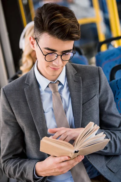 Young businessman in bus — Stock Photo