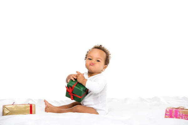 African american toddler with gifts — Stock Photo