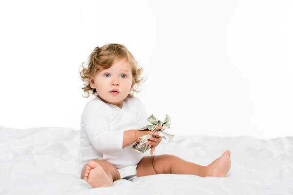 Toddler holding money — Stock Photo
