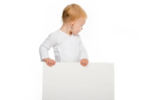 Toddler holding blank banner — Stock Photo