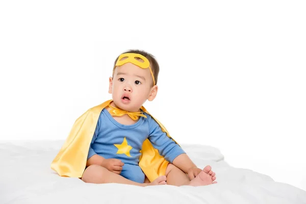 Asian toddler in superhero cape — Stock Photo