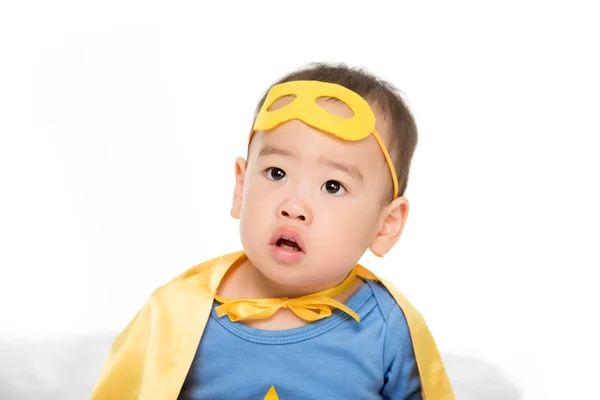 Asian toddler in superhero cape — Stock Photo