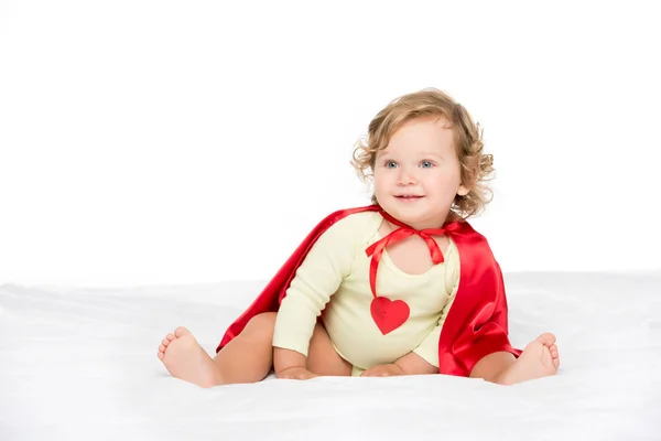 Adorable toddler in superhero cape — Stock Photo