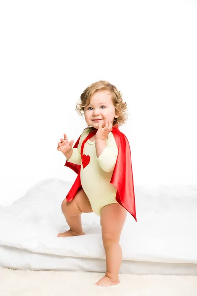 Adorable toddler in superhero cape — Stock Photo