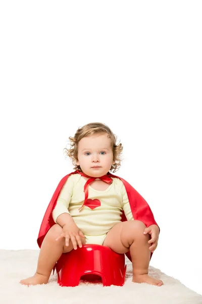 Toddler in superhero cape with pottie — Stock Photo