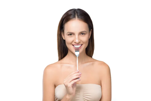 Young woman with fork — Stock Photo