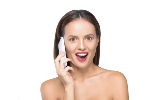 Surprised girl with smartphone — Stock Photo