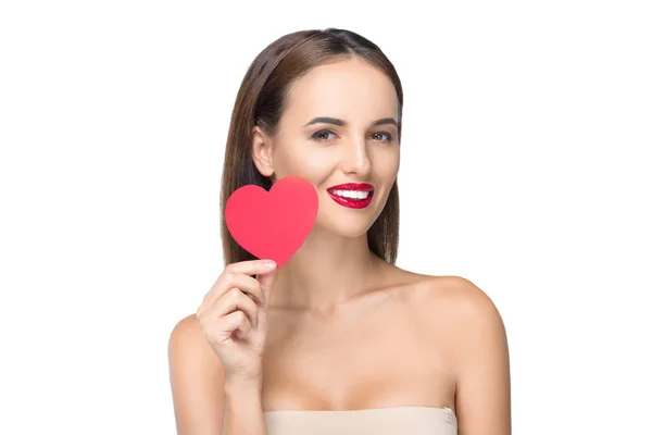 Young woman with heart symbol — Stock Photo