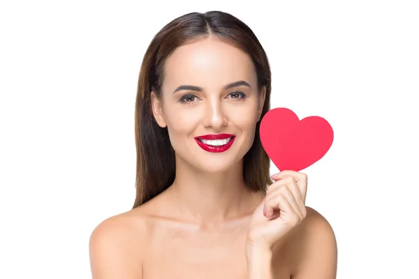 Young woman with heart symbol — Stock Photo