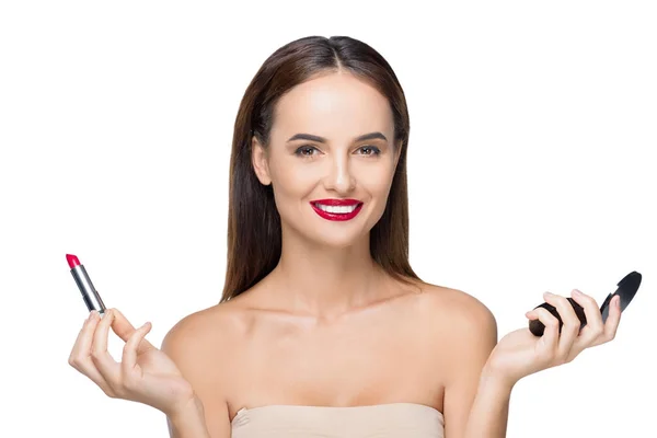 Young woman applying makeup — Stock Photo