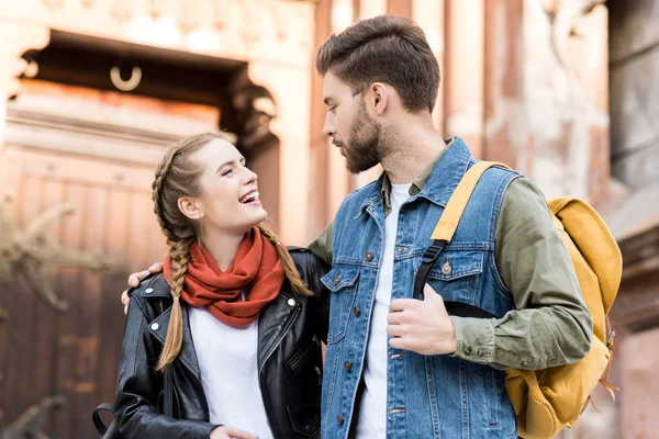 Fashionable couple looking at each other — Stock Photo