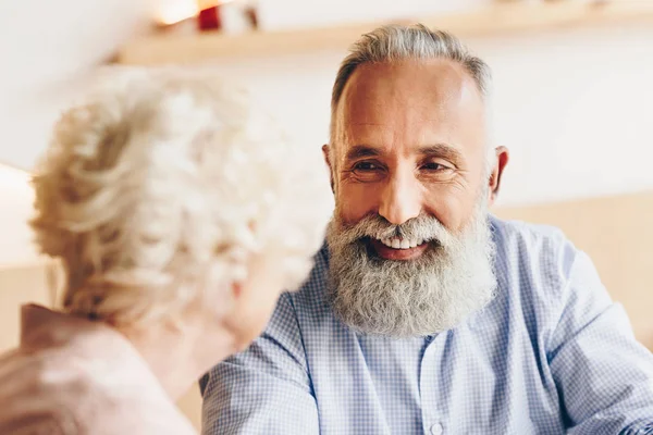 Smiling man looking at wife — Stock Photo