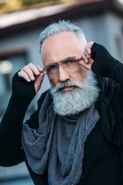 Fashionable senior man on street — Stock Photo