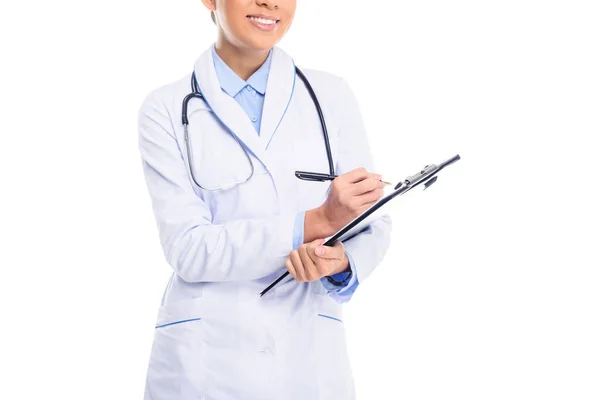 Médico escribir diagnóstico — Stock Photo