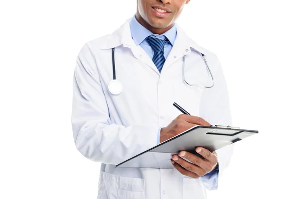 Médico escribir diagnóstico - foto de stock