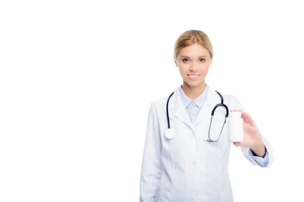 Atractivo médico con la botella de píldora - foto de stock