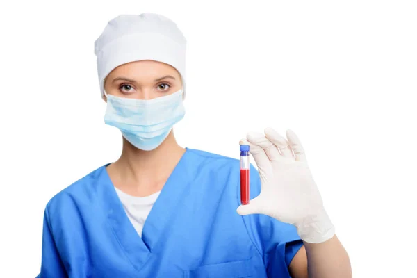 Surgeon with blood test — Stock Photo