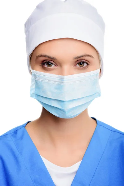 Cirujano en gorra médica y máscara - foto de stock