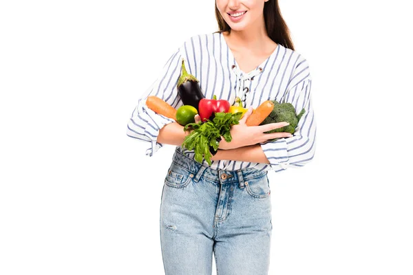 Жінка з різними свіжими овочами — стокове фото