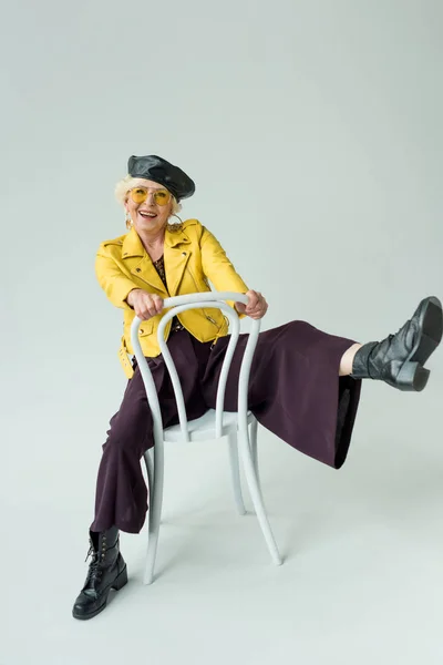 Smiling fashionable senior woman — Stock Photo