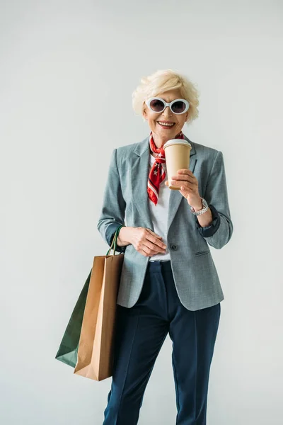 Frau mit Einkaufstüten — Stockfoto