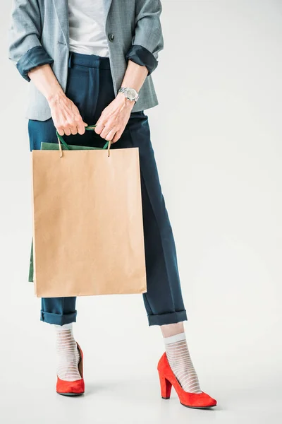 Frau mit Einkaufstüten — Stockfoto