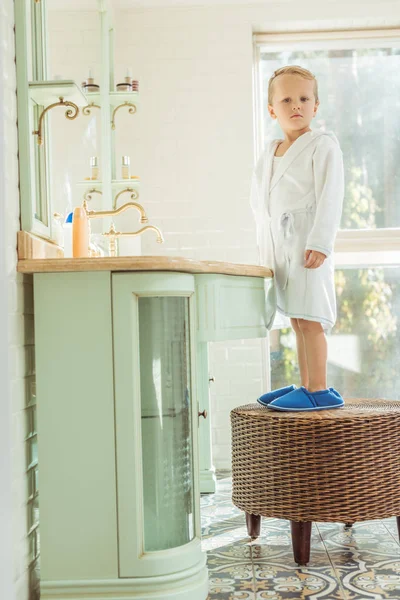 Little boy in bathroom — Stock Photo