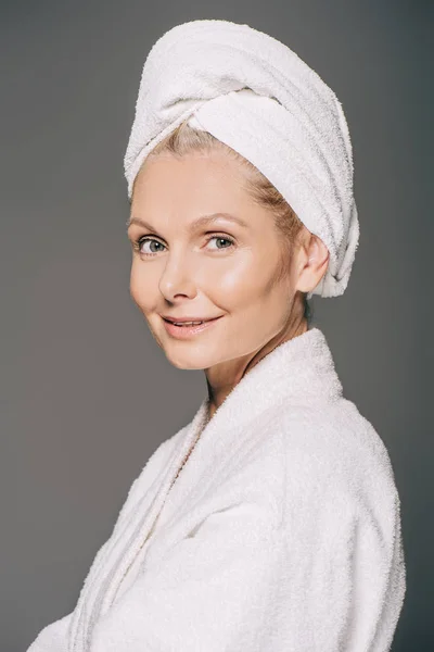 Mature woman in bath robe — Stock Photo