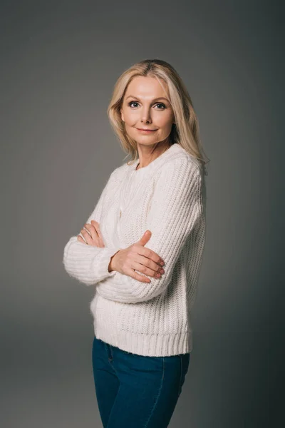 Mature woman with crossed arms — Stock Photo