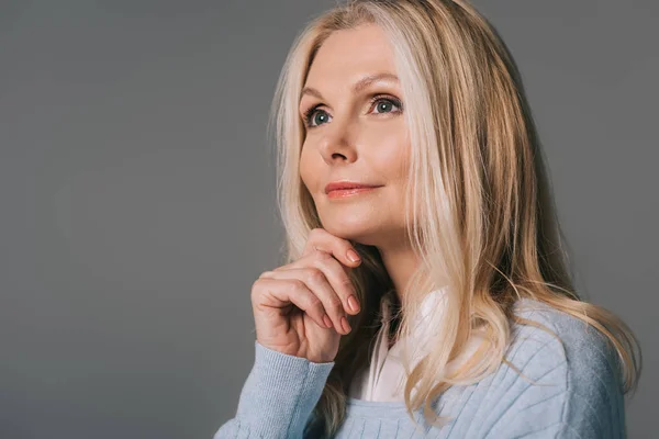 Thoughtful mature woman — Stock Photo