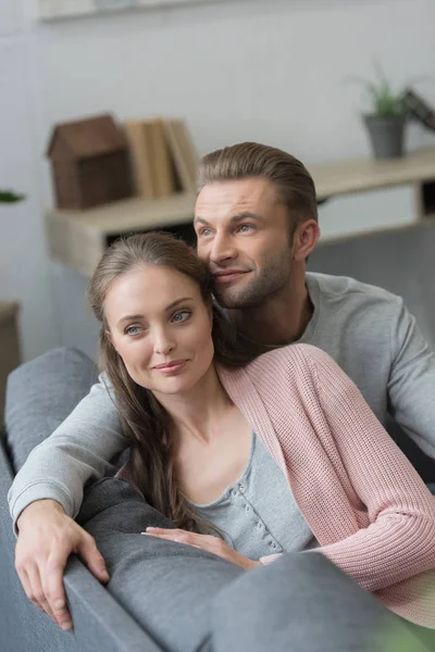 Boyfriend hugging girlfriend — Stock Photo