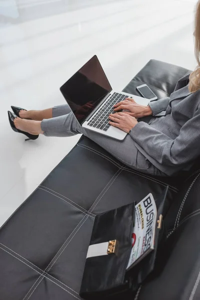 Businesswoman working with laptop — Stock Photo