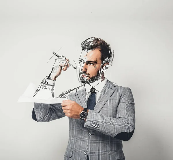 Hombre de negocios dibujándose con lápiz - foto de stock