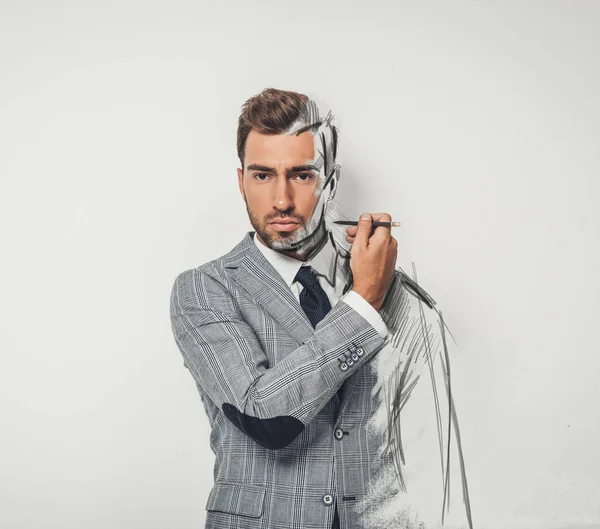 Uomo d'affari che disegna se stesso con matita — Foto stock
