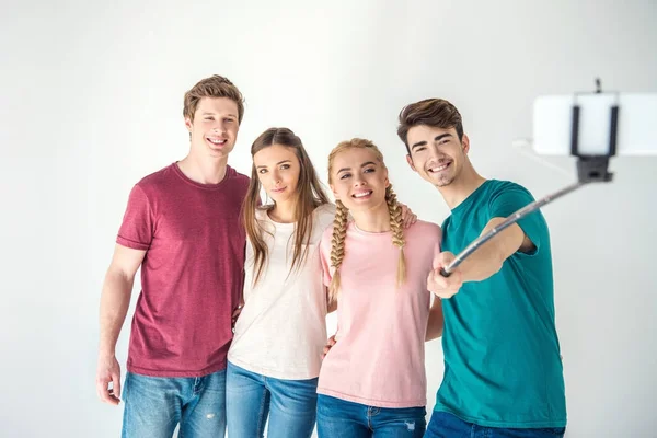 Friends taking selfie with smartphone — Stock Photo