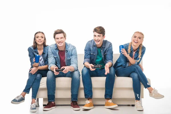 Friends playing with joysticks — Stock Photo